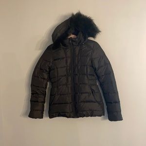 The North Face black winter jacket with detachable hood. Size Small women’s